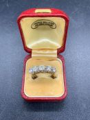 A five Stone diamond ring on 18 ct yellow gold setting