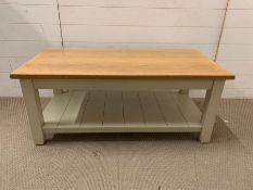 A Contemporary coffee table with oak top (110 cm w x 56 cm d x 47 cm h)