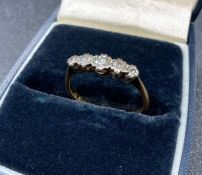 An 18ct gold and platinum five stone vintage diamond ring