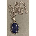 A Lapis Lazuli and silver pendant and necklace