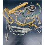 A selection of quality costume jewellery to include necklaces, bracelets and several rings.