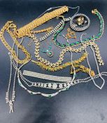 A selection of quality costume jewellery to include necklaces, bracelets and several rings.