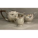 A Three piece silver tea service to include Teapot, milk jug and sugar bowl.(Total Weight 900g) by