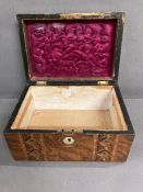 A Victorian walnut box, with broad parquetry bands to lid and front silk interior to lid