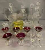 Mixed glass, to include Scottish crystal decanters, over sized French glass perfume bottle and mixed