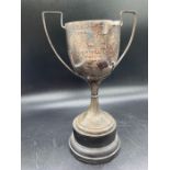 A Hallmarked silver trophy (Total Weight 156g) on separate stand