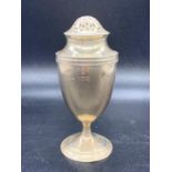 A silver sugar shaker, hallmarked for London 1908 (93 g) by William Chawner II