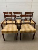 A set of 5 George III mahogany dining chairs (including 1 armchair) inlaid with satinwood banding