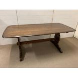 A dining table, possibly Ercol, (184 cm x 87cm x 74cm)