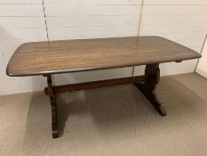 A dining table, possibly Ercol, (184 cm x 87cm x 74cm)