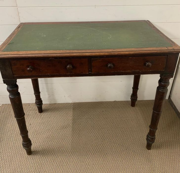 A mahogany writing table with leather top on turned legs (H7cm W91cm D52cm) - Image 2 of 6