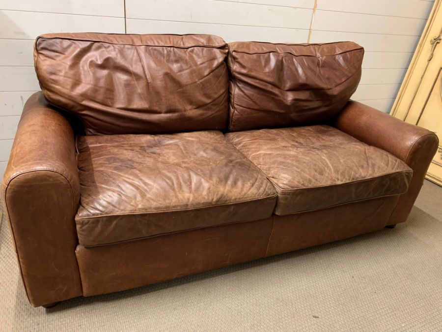 A three seater leather sofa