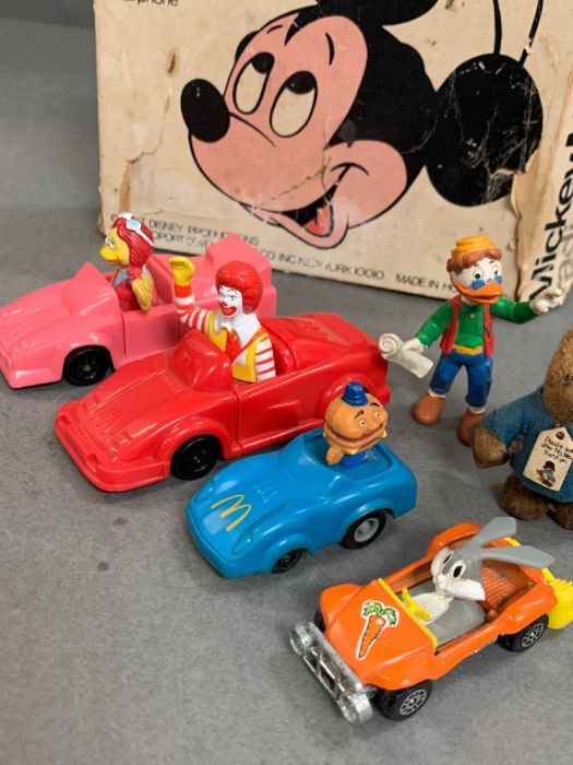 A boxed Mickey Mouse radio, Mcdonalds happy meals toys and a vintage Paddington Bear - Image 4 of 4