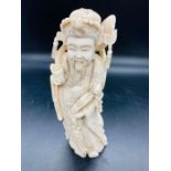 An ivory figure, signed to base 20 cm H