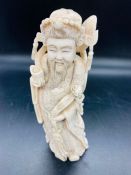 An ivory figure, signed to base 20 cm H