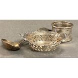 Three silver items to include a sauce ladle, napkin ring and pierced small bowl. (Total weight 68g)