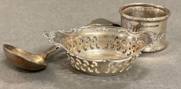 Three silver items to include a sauce ladle, napkin ring and pierced small bowl. (Total weight 68g)