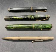 A selection of pens including 'Swan'