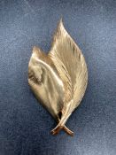 A 1964 Grosse gold plated leaf brooch