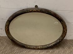 An oval hand painted mirror