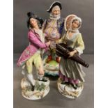 A pair of porcelain figures of Musicians, 19th century, after Meissen originals, she playing the