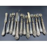 A selection of Continental .800 silver handled cutelry