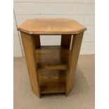 An oak three tier table (H62cm Sq43cm)