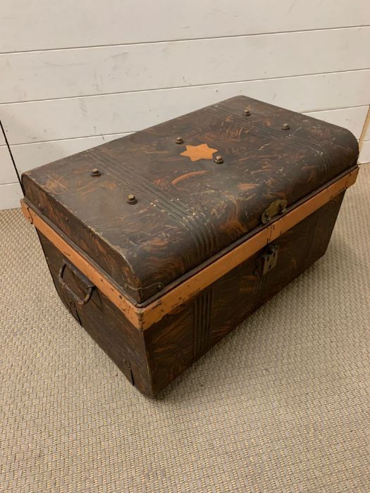 A metal Japanned travel trunk