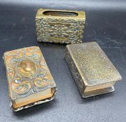 Three brass decorative matchbox covers