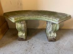 A garden bench sitting on scrolled cast ends (H43cm W103cm)