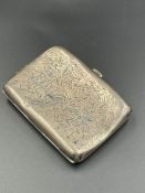 A silver cigarette case by Clark & Sewell, hallmarked for Birmingham 1939