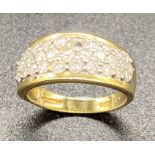 An 18ct gold diamond pave ring (Approx 1 ct diamonds), one small missing stone.