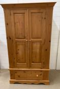 A double pine wardrobe with drawer underneath (H103cm W110cm D62cm)