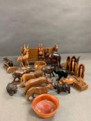 A selection of wooden carved animals etc