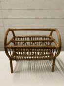 A wicker magazine rack