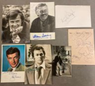 A selection of autographs to include, Tony Curtis, Roger Moore etc