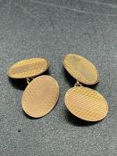 A Pair of 9ct gold Gents cuff links (Total Weight 6.4g)