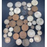 A selection of South African coins, various denominations and years.