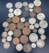 A selection of South African coins, various denominations and years.