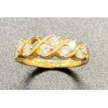 A Diamond ring on an 18ct yellow gold setting, (Missing stone and Total Weight 5.2g)