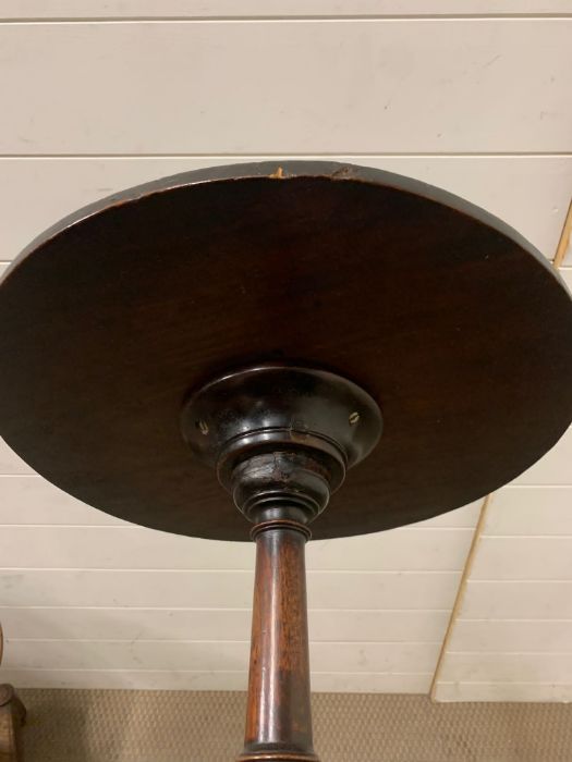 A George III style tripod table with circular top, three down swept legs (H58cm Dia 42cm) - Image 3 of 3