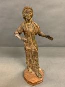 A cast metal sculpture of a lady on wooden base (H44cm arm AF)