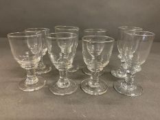 Eight heavy 19th century tall cup bowl goblets with collars various sizes