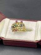 A Russian wedding ring style multiple ring with emeralds, rubies, diamonds and sapphires.(8g)