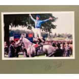 A signed Frankie Dettori photograph