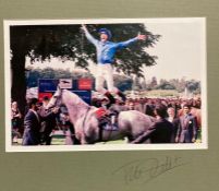 A signed Frankie Dettori photograph