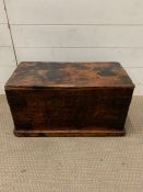 A wooden toolbox/chest