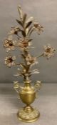 A Brass centre piece with floral spray in urn.