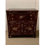 A Chinese inlaid drink cabinet with carved legs