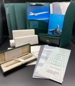 A selection of Concorde memorabilia including cross pens, menus etc